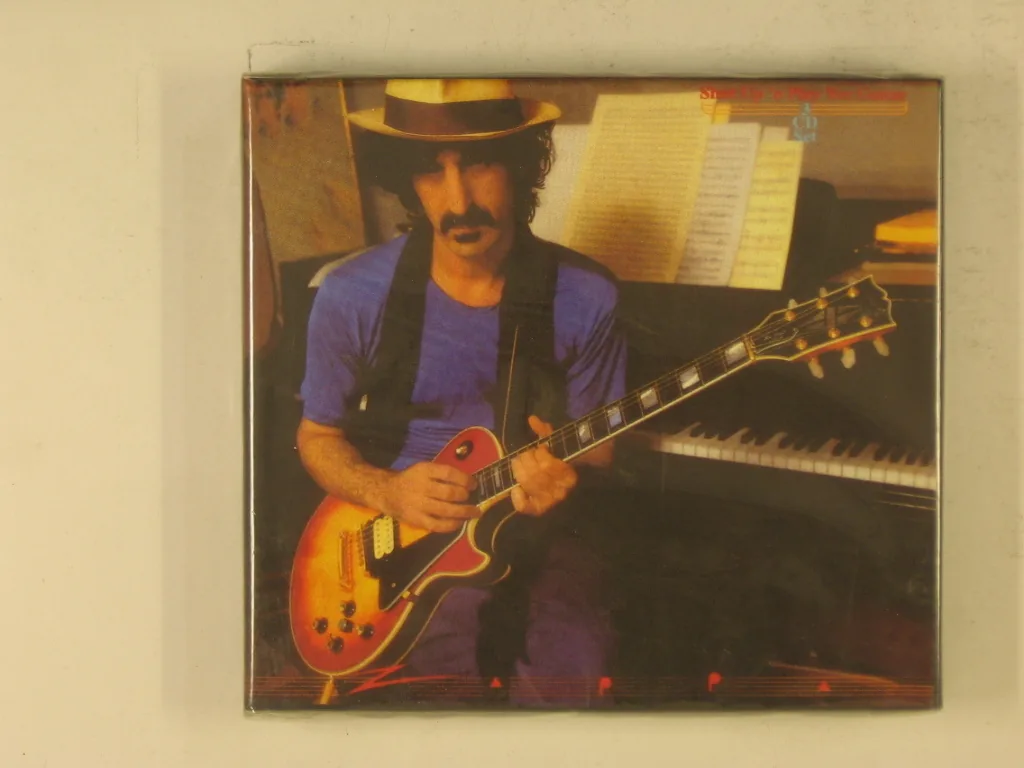 Copertina di Shut Up 'N Play Yer Guitar