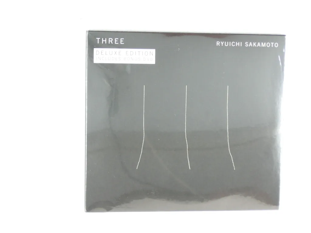 Copertina di Three