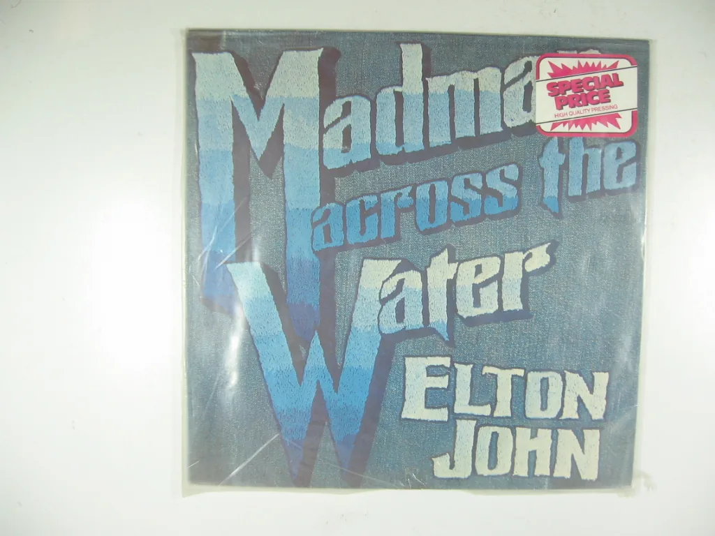Copertina di Madman Across The Water