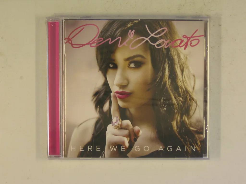 Copertina di Here We Go Again