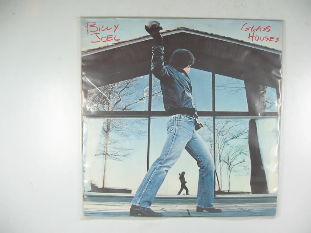 Copertina di Glass Houses
