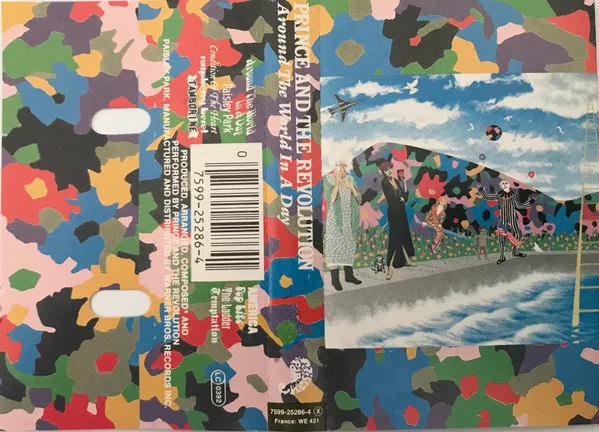 Copertina di Around The World In A Day