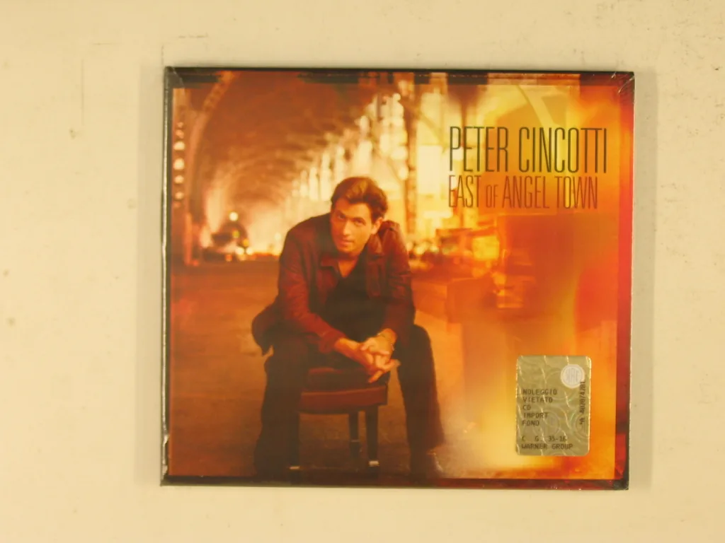 Copertina di East Of Angel Town