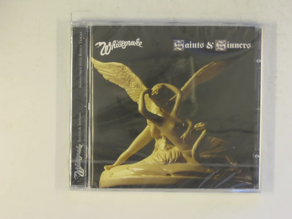 Copertina di Saints & Sinners