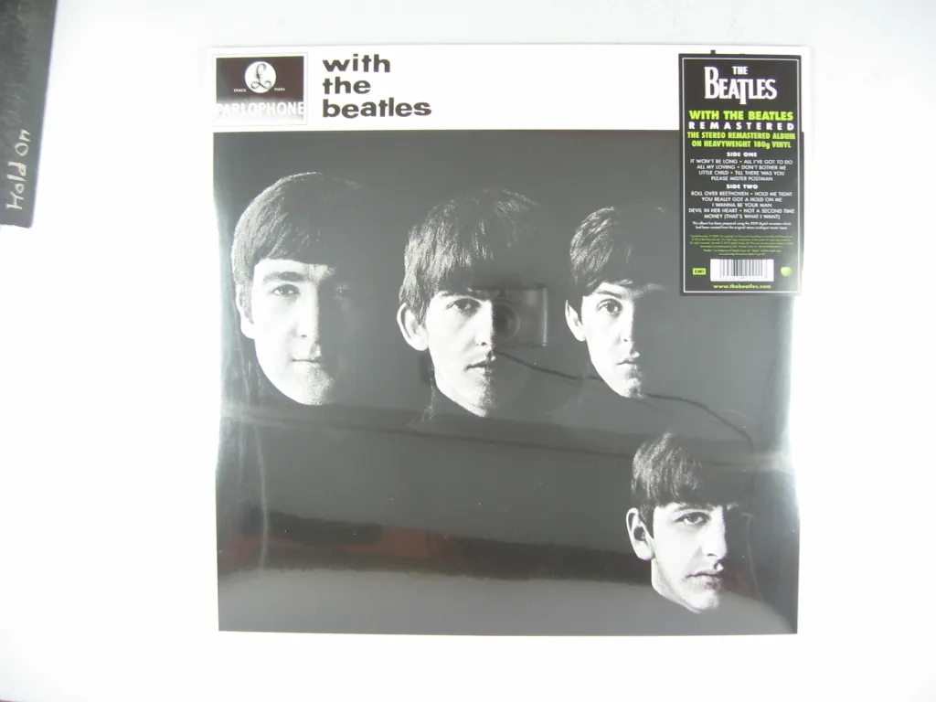 Copertina di With The Beatles