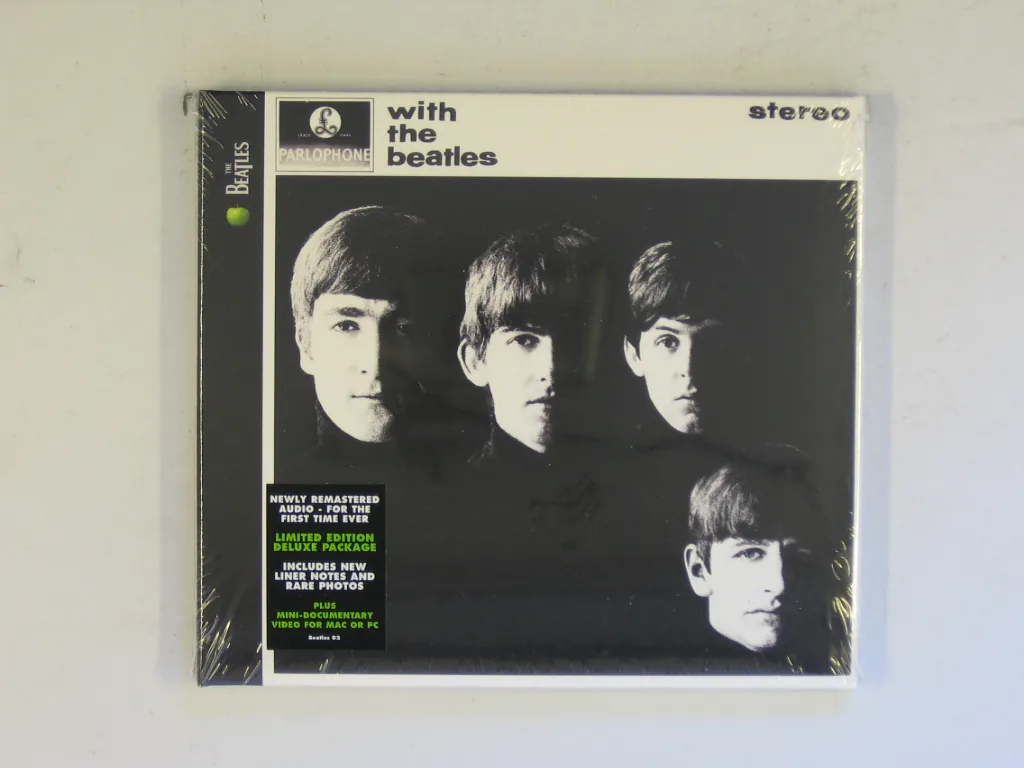 Copertina di With The Beatles