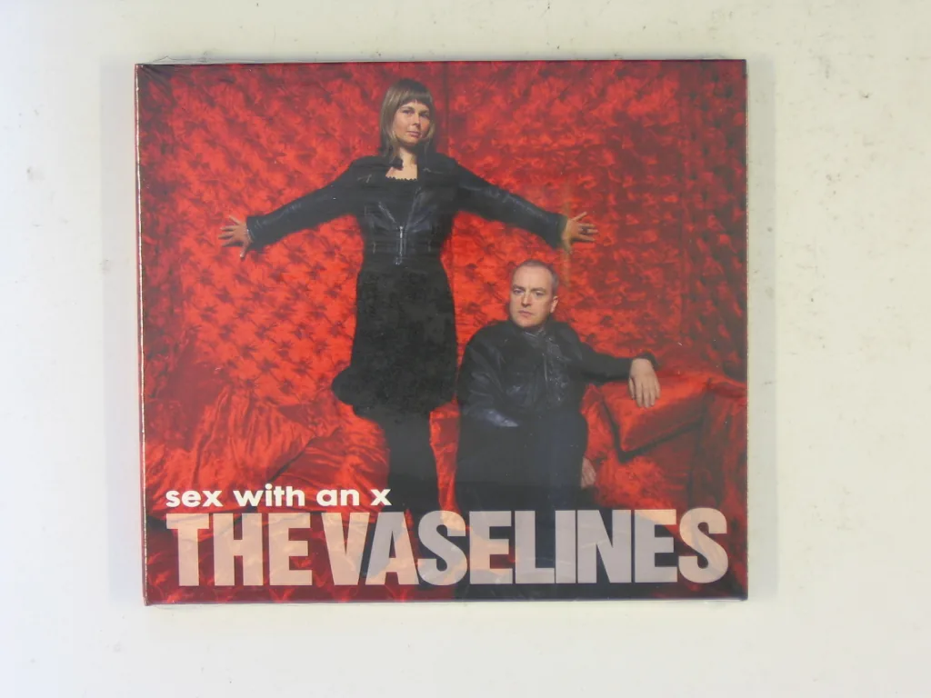 Copertina di Sex With An X
