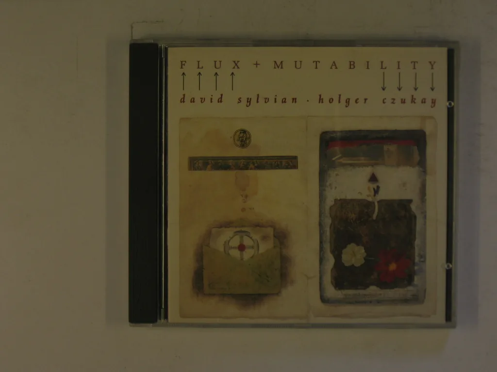 Copertina di Holger Czukay (Flux + Mutability)