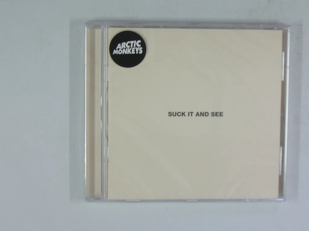 Copertina di Suck It And See