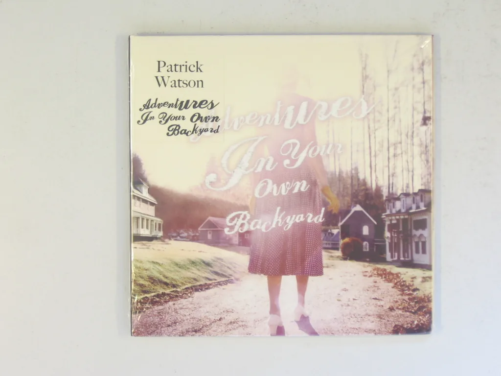 Copertina di In Your Own Backyard
