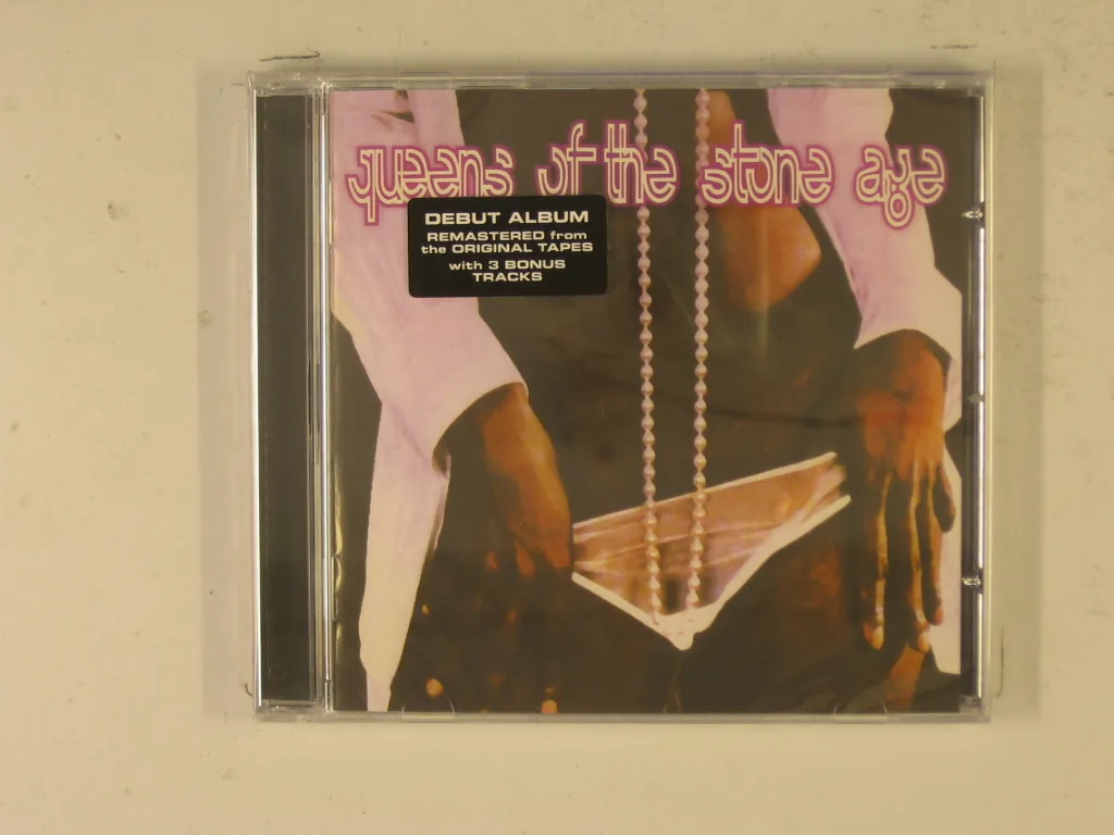 Copertina di Queens Of The Stone Age