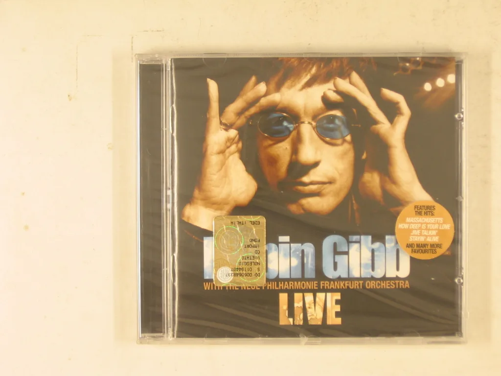 Copertina di With The Neue Philharmonie Frankfurt Orchestra Liv