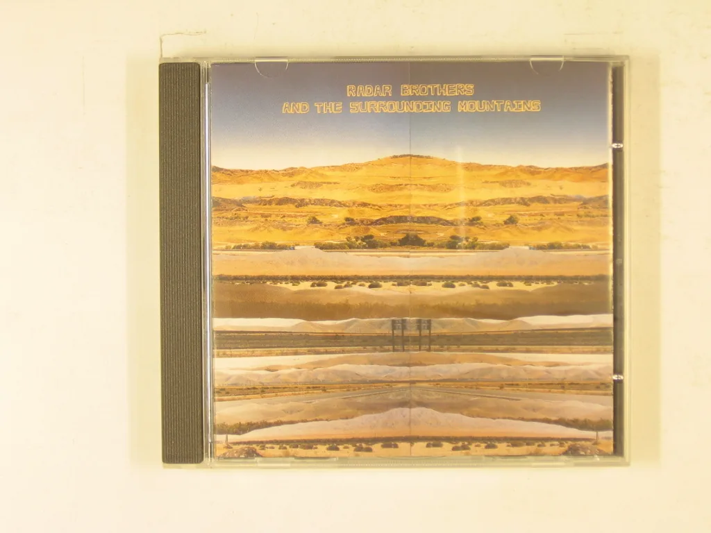 Copertina di And The Surrounding Mountains