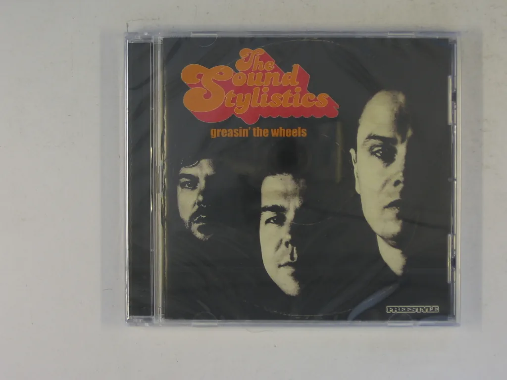 Copertina di Greasin' The Wheels