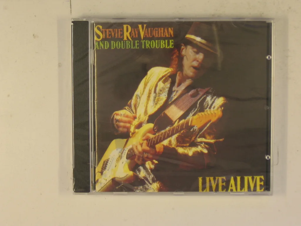 Copertina di Live Alive