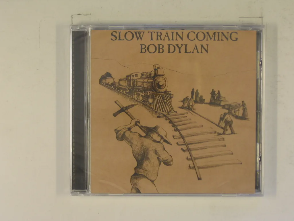 Copertina di Slow Train Coming