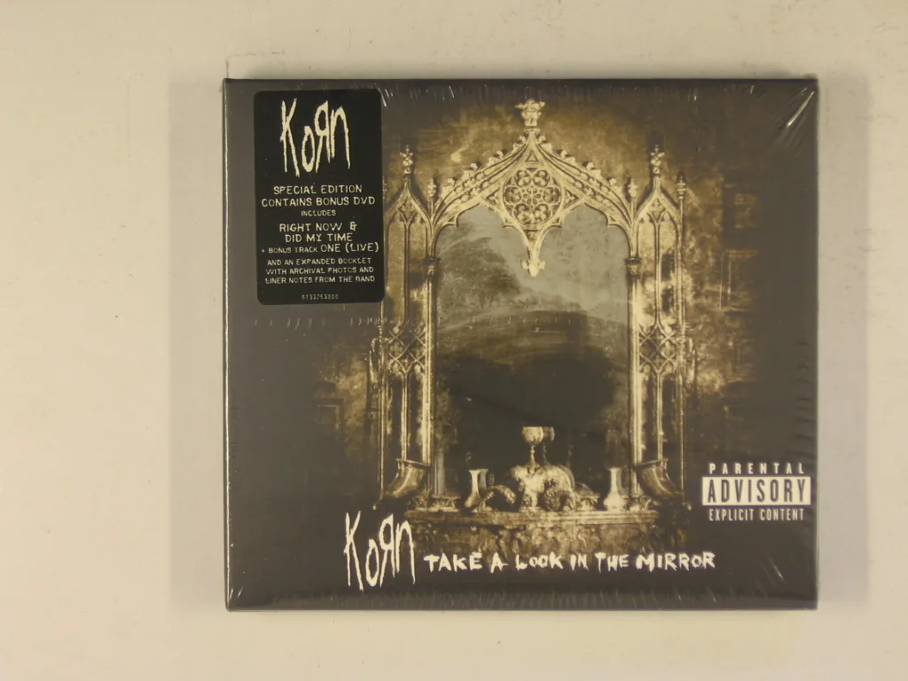 Copertina di Take A Look In The Mirror