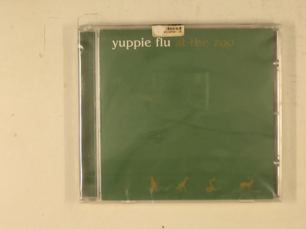 Copertina di At The Zoo