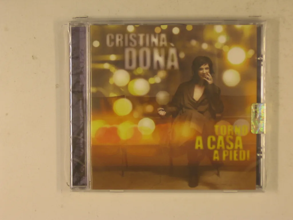 Copertina di Torno A Casa A Piedi