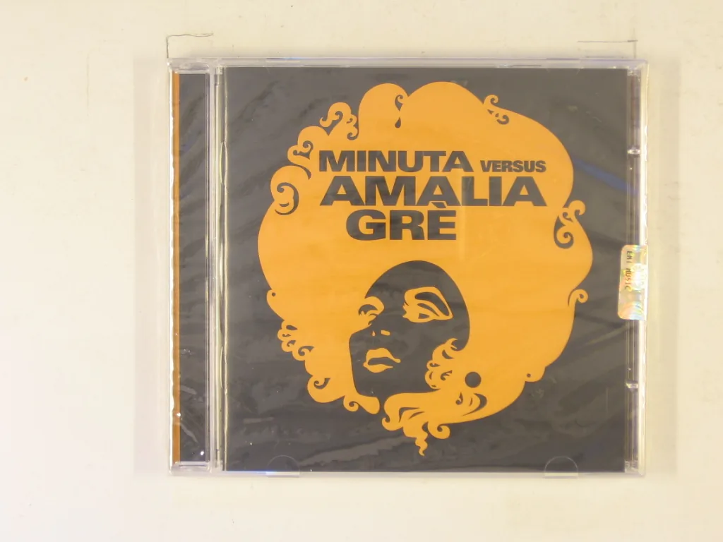 Copertina di Minuta Versus Amalia Grè