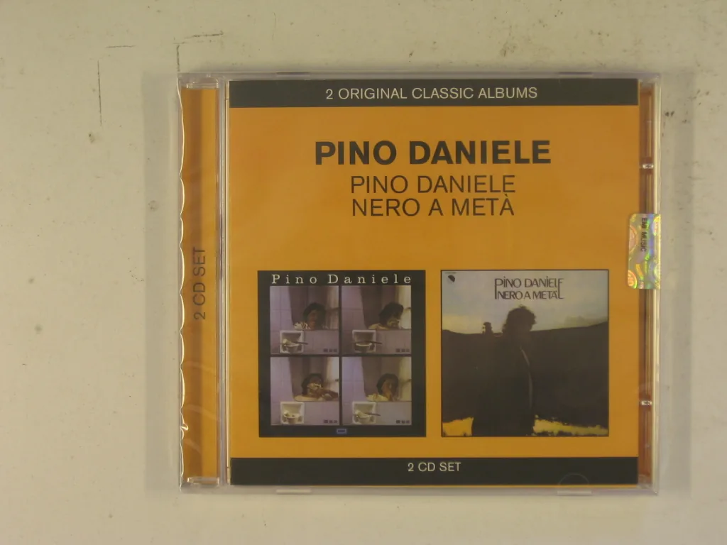 Copertina di Pino Daniele-Nero A Meta'