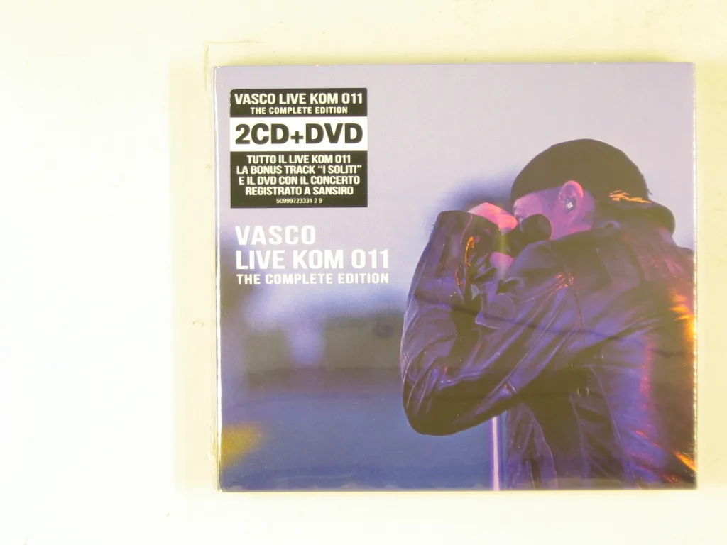 Copertina di Live Kom 011