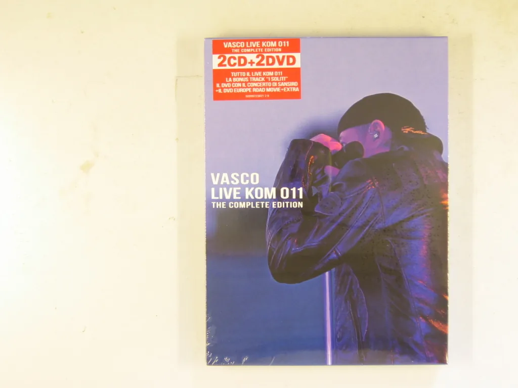Copertina di Live Kom 011