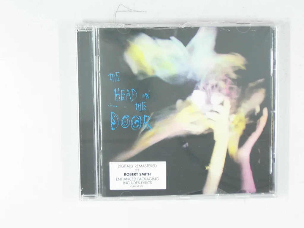 Copertina di The Head On The Door