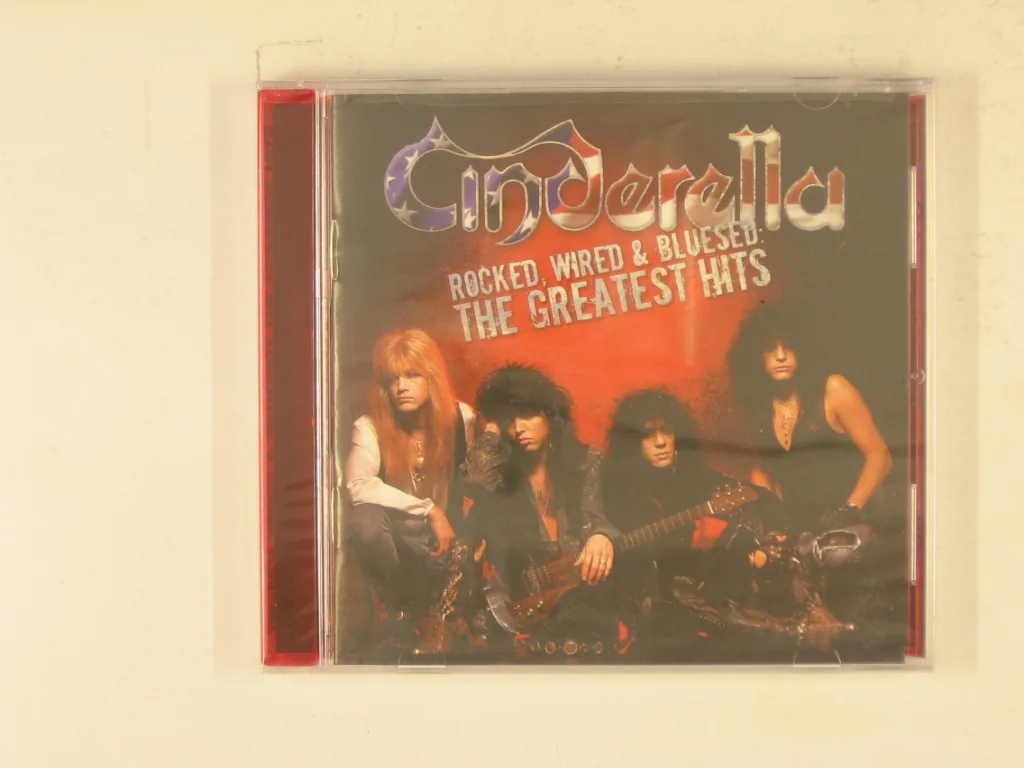 Copertina di Rocked, Wired & Bluesed: The Greatest Hits