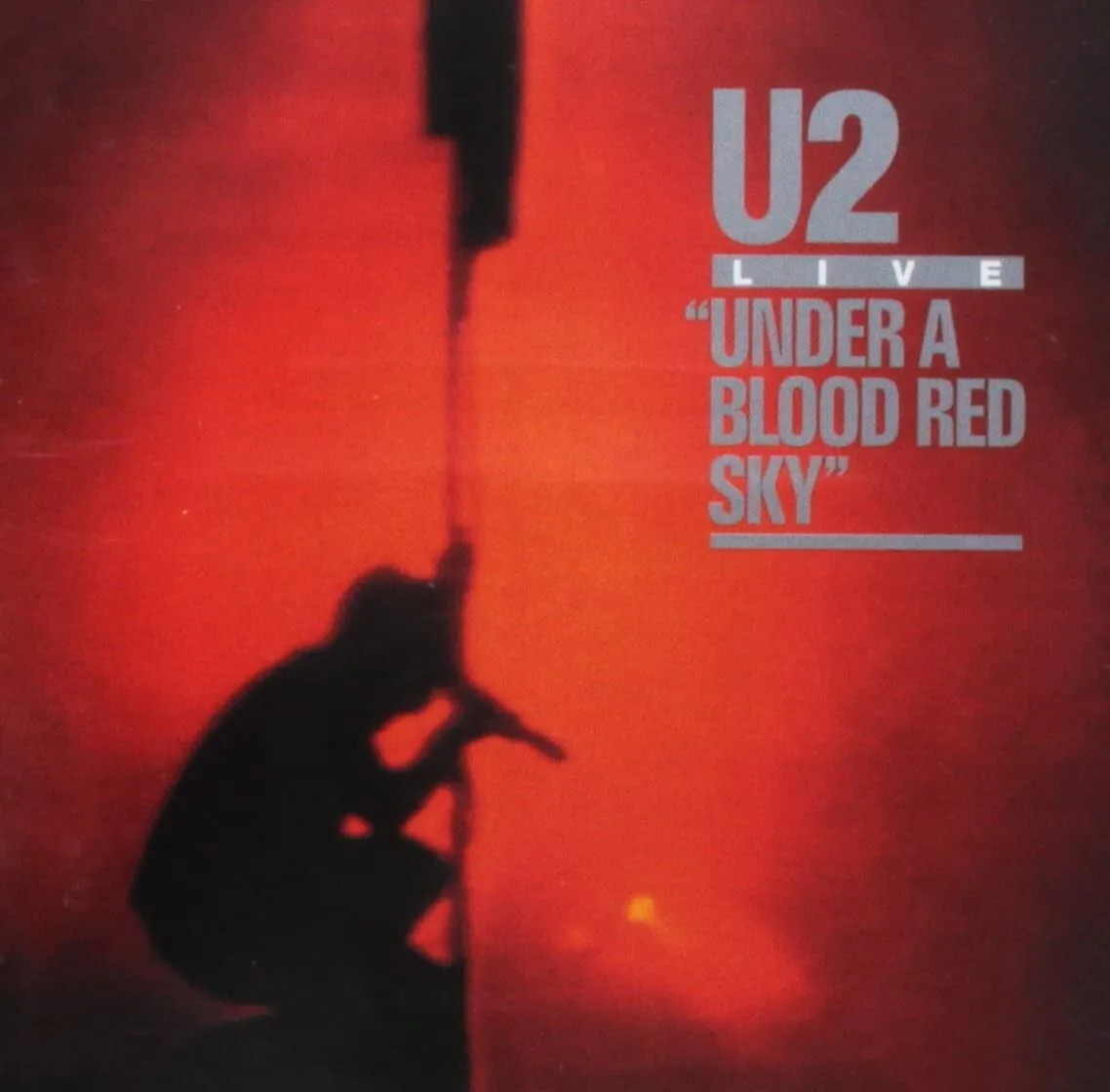 Copertina di Live "Under A Blood Red Sky"