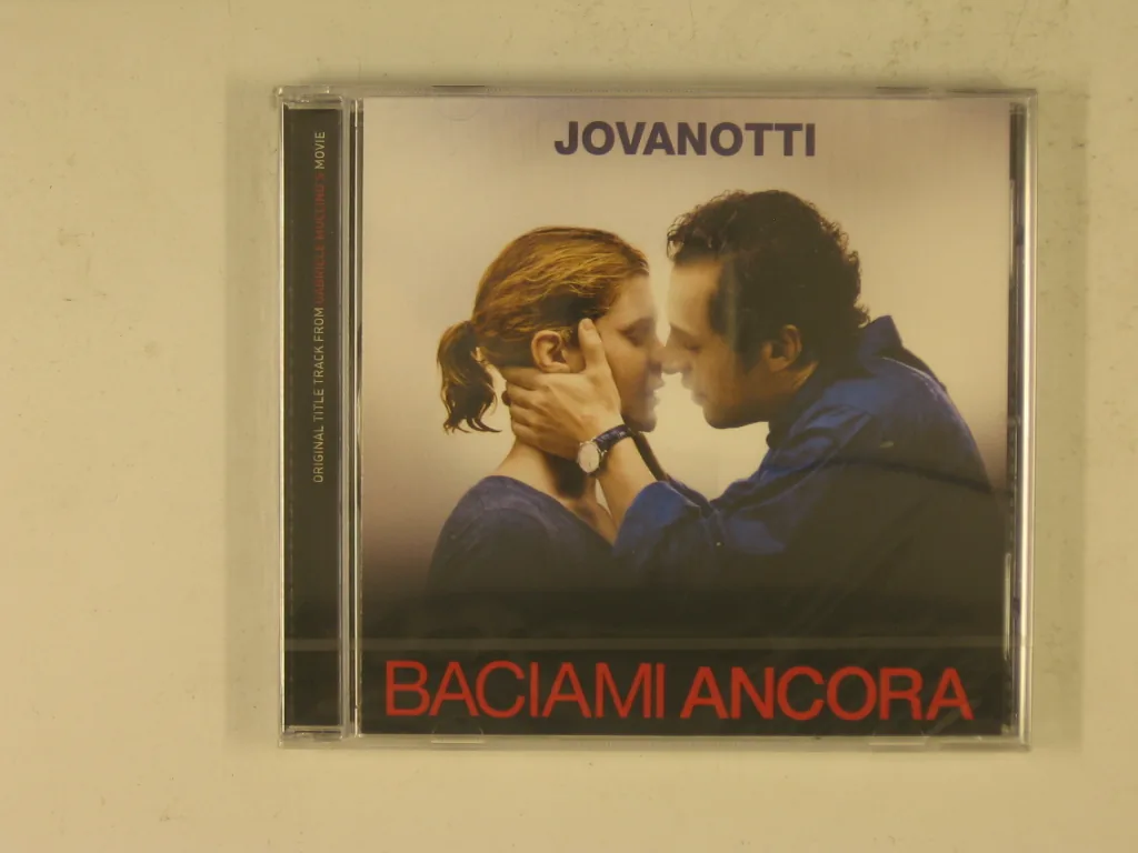 Copertina di Baciami Ancora