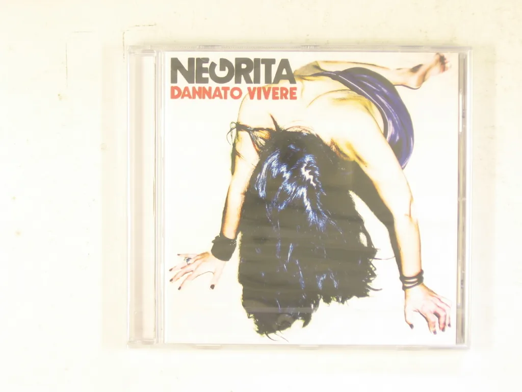 Copertina di Dannato Vivere