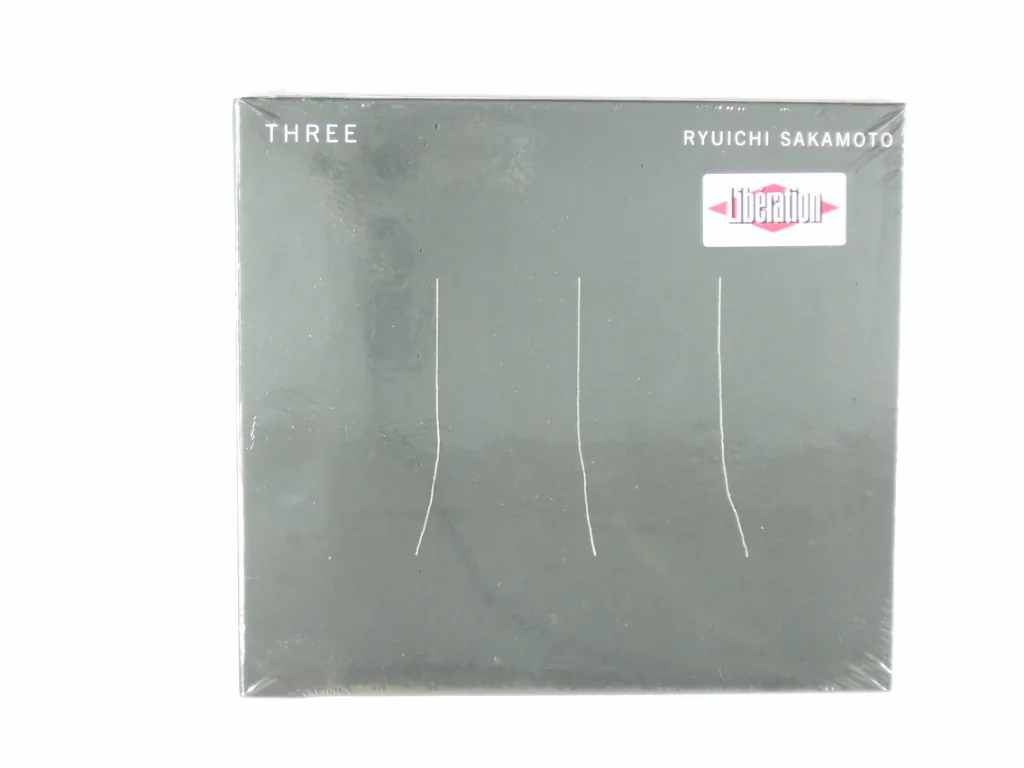 Copertina di Three