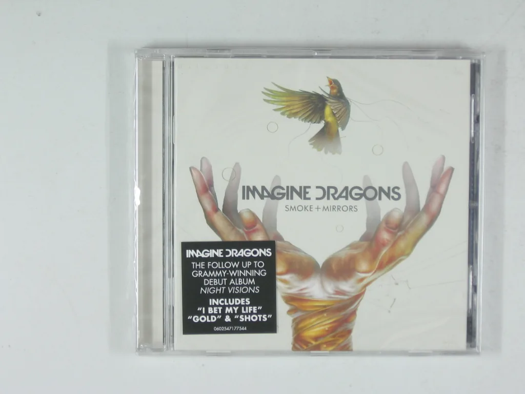 Copertina di Smoke + Mirrors