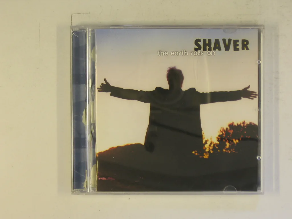 Copertina di The Earth Rolls On