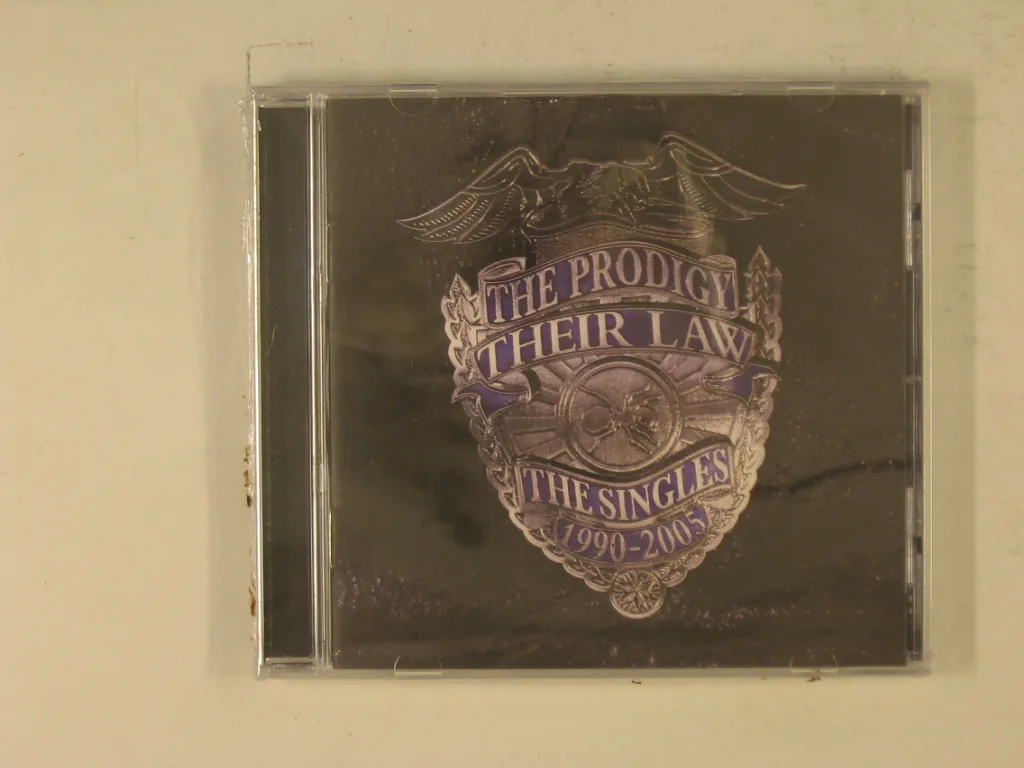 Copertina di Their Law- The Singles 1990-2005