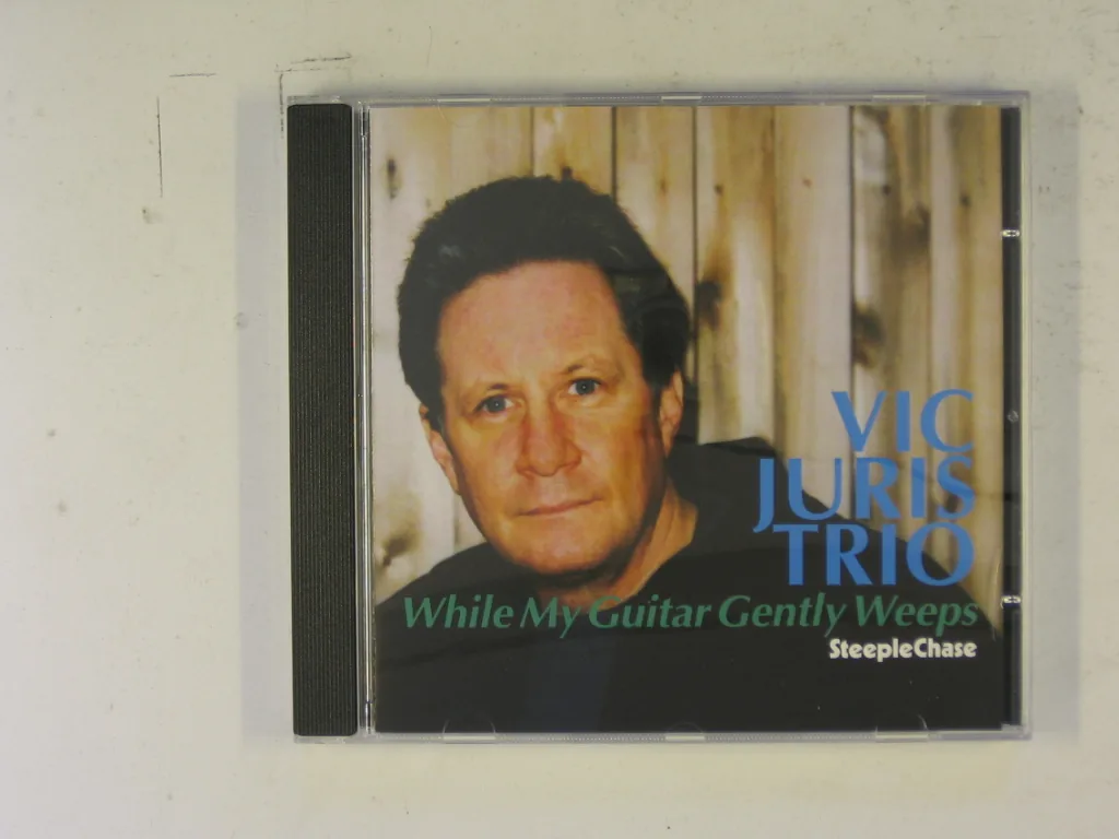Copertina di While My Guitar Gently Weeps
