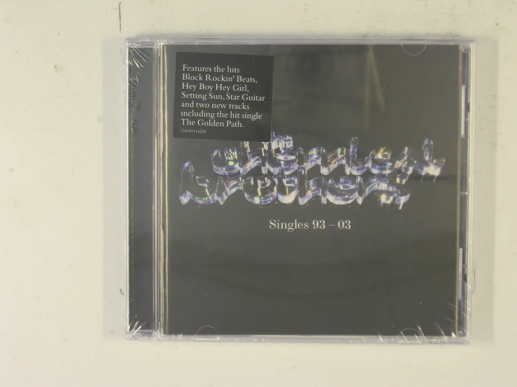 Copertina di Singles 93-03