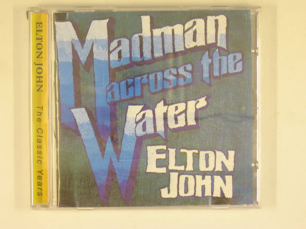 Copertina di Madman Across The Water