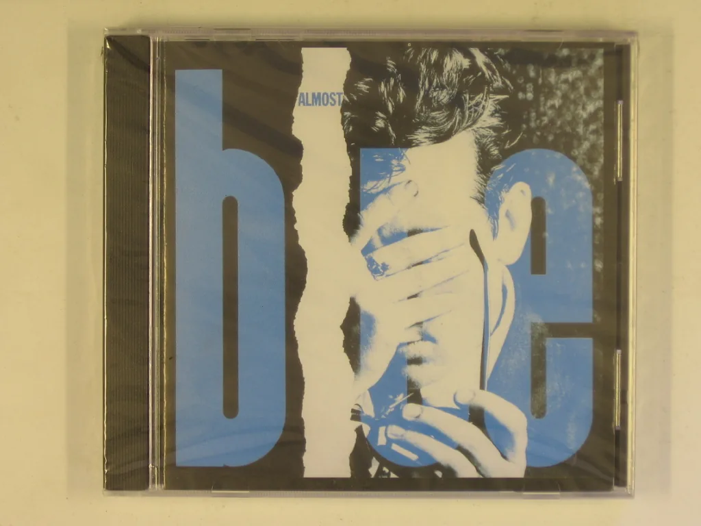 Copertina di Almost Blue
