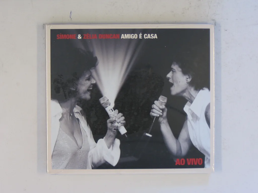 Copertina di Amigo È Casa-Ao Vivo