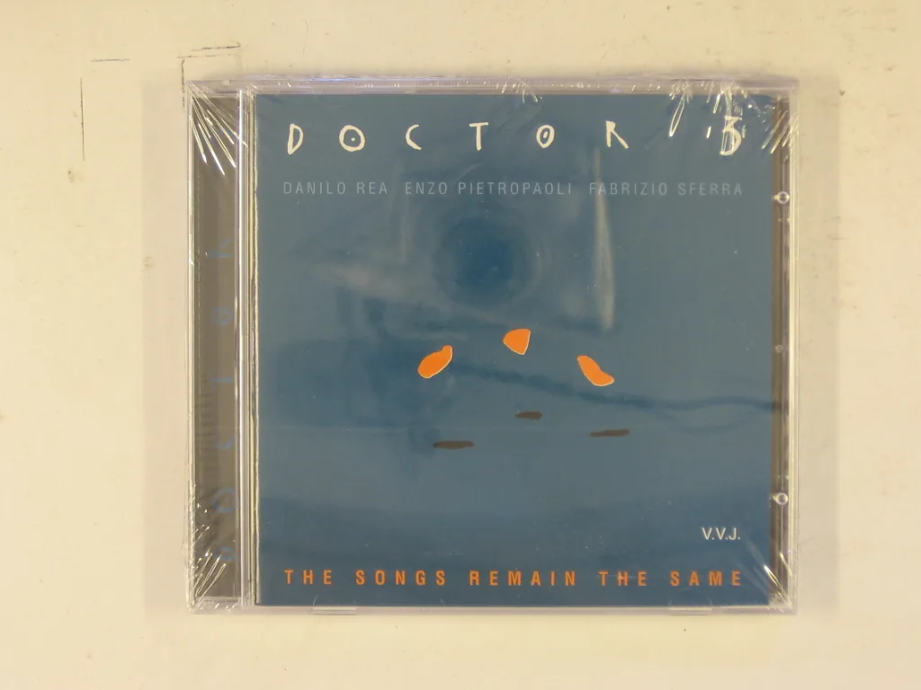 Copertina di The Songs Remain The Same
