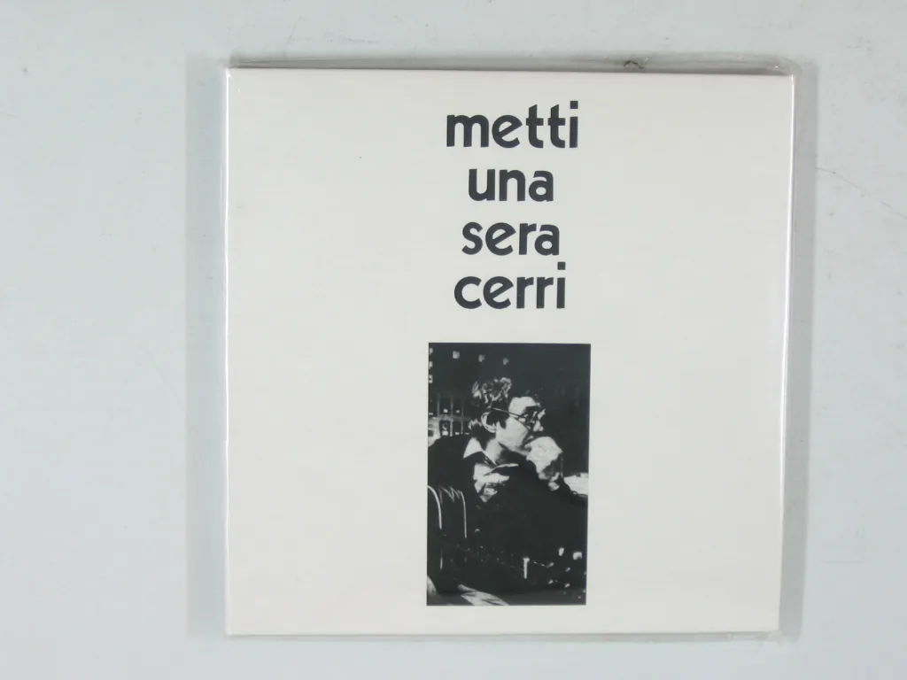 Copertina di Metti Una Sera Cena