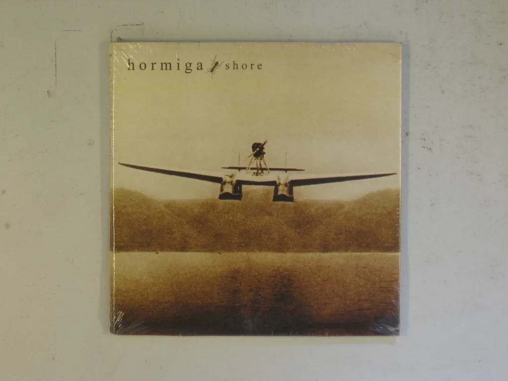 Copertina di Shore
