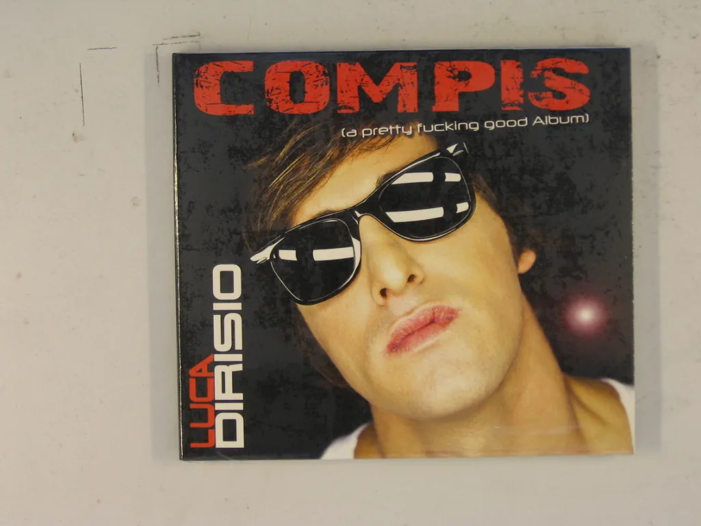 Copertina di Compis