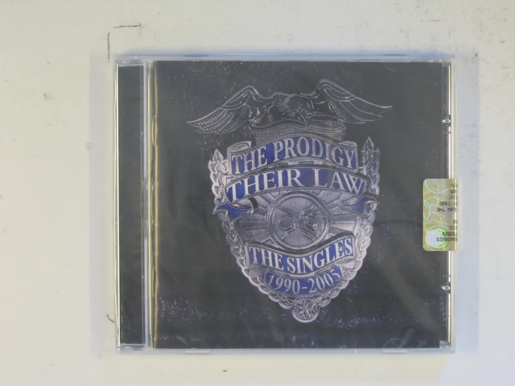 Copertina di Their Law- The Singles 1990-2005