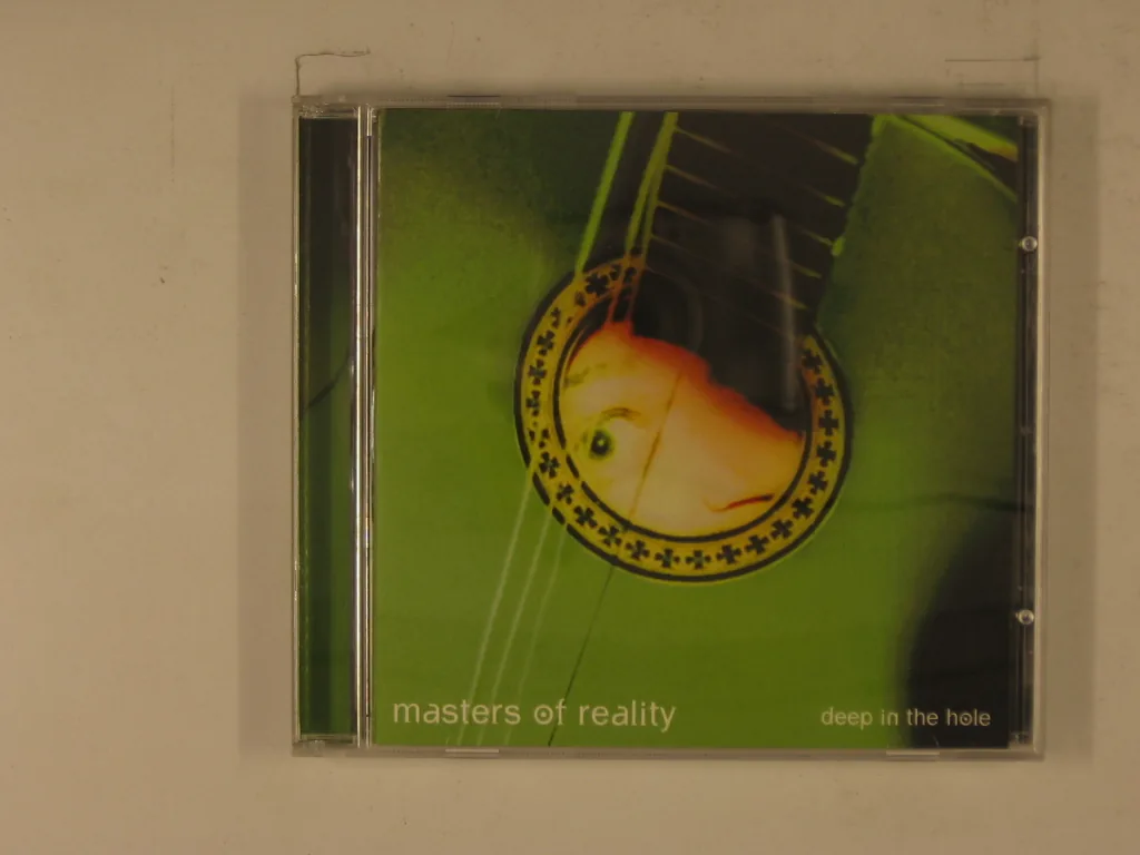 Copertina di Deep In The Hole