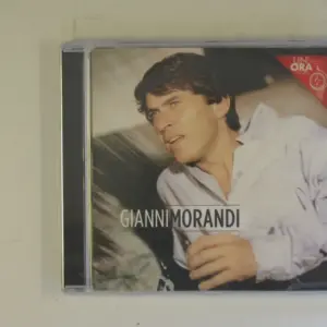 Copertina di Un'Ora Con