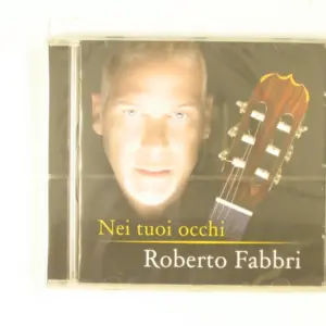 Copertina di Nei Tuoi Occhi