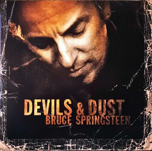 Copertina di Devils & Dust